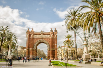 Fototapeta na wymiar Passeig de Luis Companys and Arc de Triomf or Arco de Triunfo - triumphal arch in Barcelona / Catalania / Spain