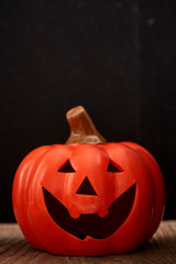 Autumn a pumpkin on wooden background