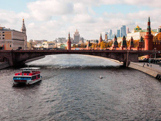 View of Kremlin and City on the promenade of Moscow river, Russia.