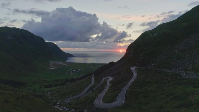 View of the Sun Setting over the Horizon at Hoddevik