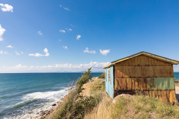 The house of the fisherman on the hill at the seashore. The abandoned house of the fisherman on the hill at the coast of the Black Sea. Ravda. Bulgaria