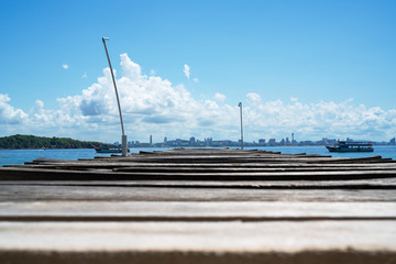 wooden bridge pier in the sea at Khao Lan, opposite with Pattaya city beach, Thailand