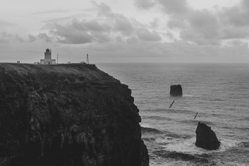 Lighthouse at cliff © HTKmedia