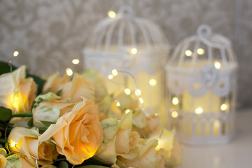 Peach roses with garlands and decorative cells