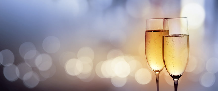 Clink glasses with champagne for a new year
