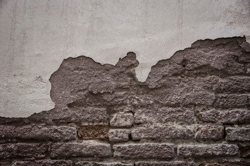 Stone old wall background with large-sized stones close-up