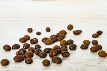 coffee beans on wooden background