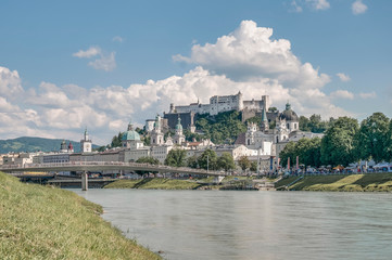 Naklejka premium Salzach river on its way through Salzburg, Austria