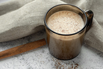 Cup of milk with cinnamon