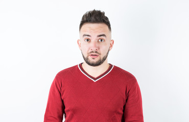 Obraz premium Close up portrait of young surprised male
