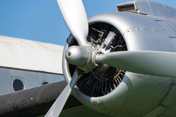 The propeller of an old plane shot close-up.