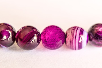 Row of purple chalcedony close-up. Limited depth of field.