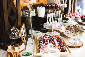 Delicious wedding reception candy bar dessert table