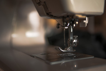 Copy space frame with sewing tools and accessories, traditional business, factory, concept manual work, workplace, electric sewing machine