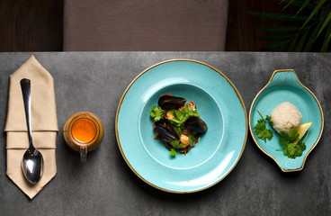 Fish soup with seafood and fried fish