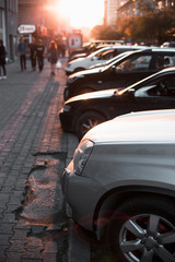 road and buildings at city with sunset