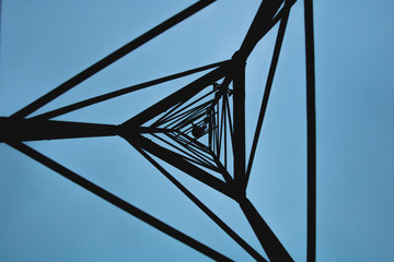 silhouette of a tower shot from below 