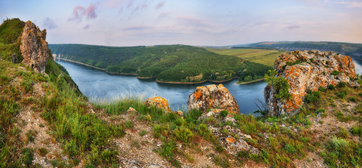 Naklejka premium picturesque sunrise over the river canyon. spring morning