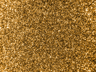 Background sequin. GOLDEN BACKGROUND. glitter surfactant. Holiday abstract glitter background with blinking lights. Fabric sequins in bright colors. Fashion fabric glitter, sequins.