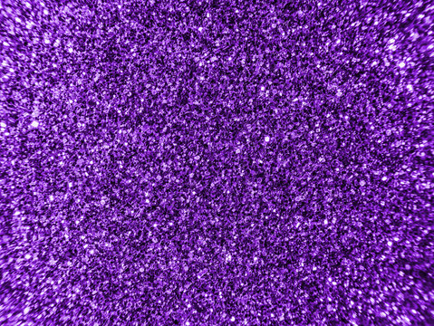 Background sequin. PURPLE BACKGROUND. glitter surfactant. Holiday abstract glitter background with blinking lights. Fabric sequins in bright colors. Fashion fabric glitter, sequins.