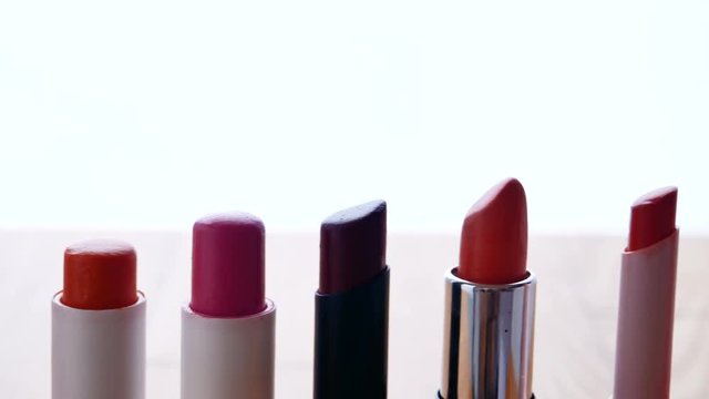 dollyshot Many lipsticks on white background.
