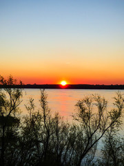 Obraz premium Sunset in the Uruguay river - Uruguaiana, Brazil