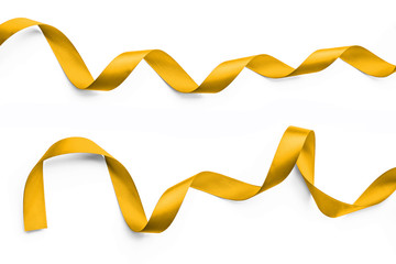 Ribbon in bright yellow gold color satin band isolated on white background with clipping path