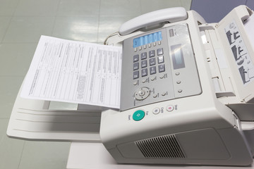 The fax machine for Sending documents in the office concept equipment needed in office