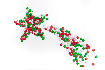 star of chocolate candies of Christmas colors