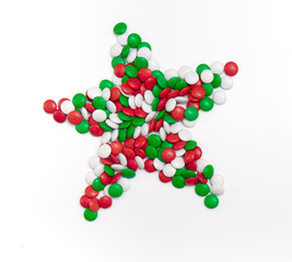 star of chocolate candies of Christmas colors