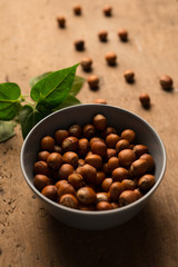 hazelnuts with wood background