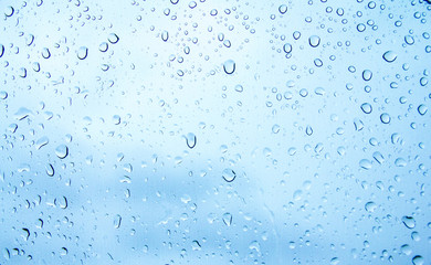 water drops or rain drops on glass background