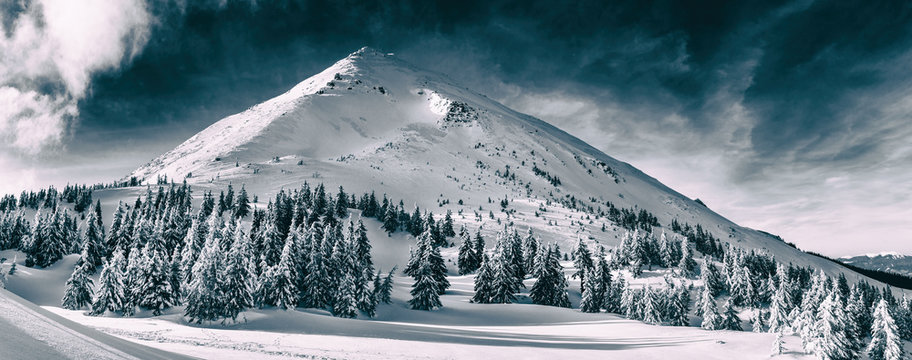 Beautiful winter landscape of The Carpathian Mountains. Petros peak covered with snow.