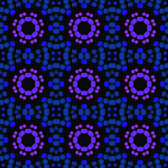 Seamless abstract pattern background with a variety of colored circles.