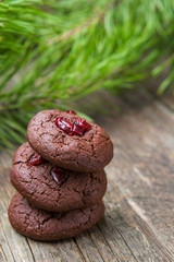 Hommede freshly baked chocolate cookies on wooden background