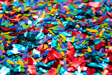 Fototapeta na wymiar NYE2019: Colorful Sparkly Foil And Paper Confetti Background
