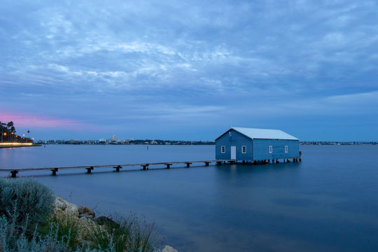 Blue Boat House In Perth at cloudy sunset