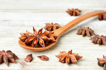 star anise fruits on the wooden board