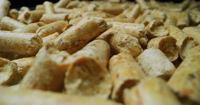 Super macro and slow motion framing of pellets or biofuels for stoves. 