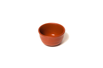 Brown clay cup. Concept of tea ceremony, breakfast, tea