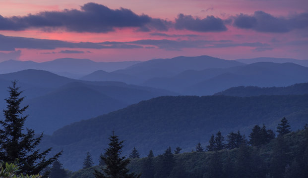 Great Smoky Mountains National Park, North Carolina, USA - July 4, 2018: Mountain layers full of colorful foliage right after sunset in the Great Smoky Mountains