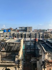 Scenic panoramic view in the sunrise morning hours over the roofs of Havana (Habana) city, capital of the Caribbean island of Cuba and a tourist destination with a vintage latin downtown neighborhood