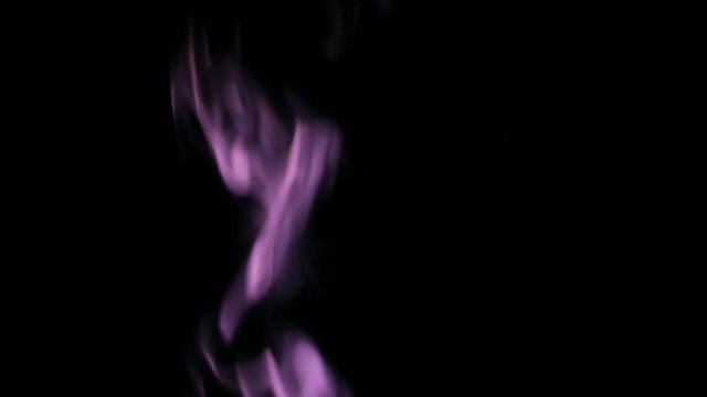 Purple Steam Rises from up. Purple smoke over a black background. Smoke slowly floating through space against black background. 4K UHD