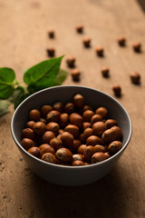 hazelnuts with wood background