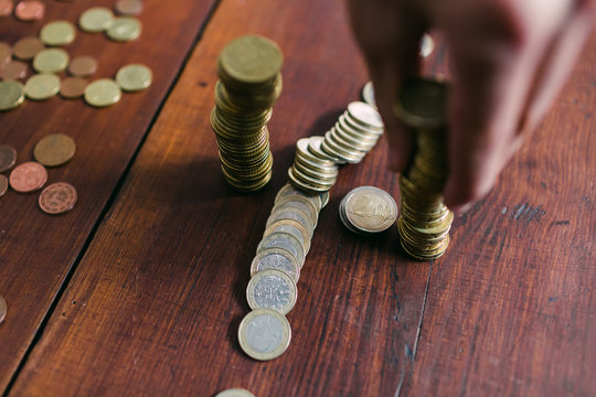 Crop guy counting coins