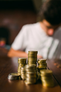 Crop guy counting coins