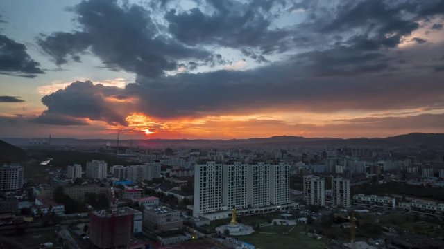 Sunset time lapse over Ulan Bator Mongolia. Building landscape