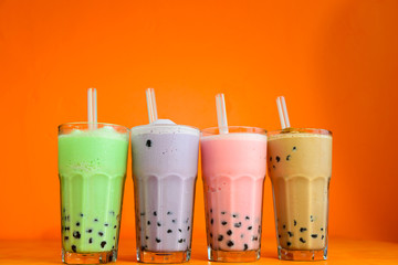 Four colour four flavour Boba smoothy milk tea with tapioca balls.