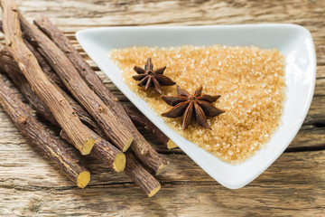 licorice root, brown sugar and anise on the table