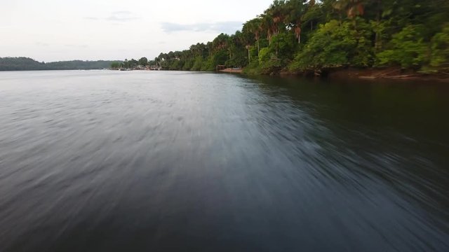 Close flight over the Oiapoque river border between Brazil and Guiana